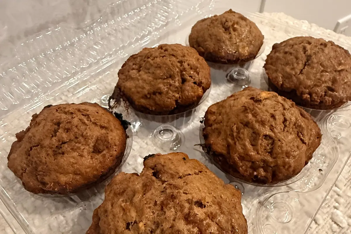 Six freshly baked cinnamon apple sourdough muffins