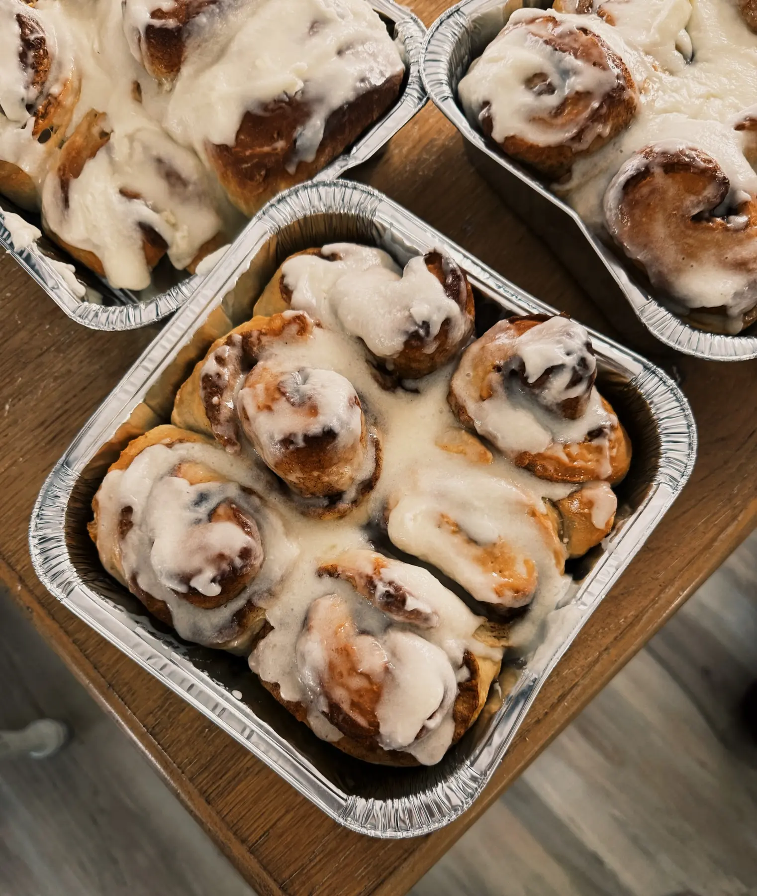 Fresh glazed cinnamon rolls from Kember Bakery